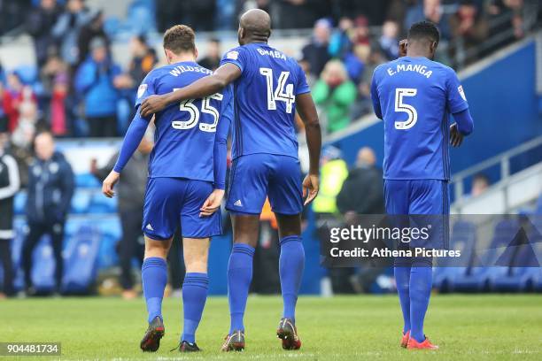 Sol Bamba of Cardiff City wraps his arm around Yanic Wildschut after the final whistle of the Sky Bet Championship match between Cardiff City and...