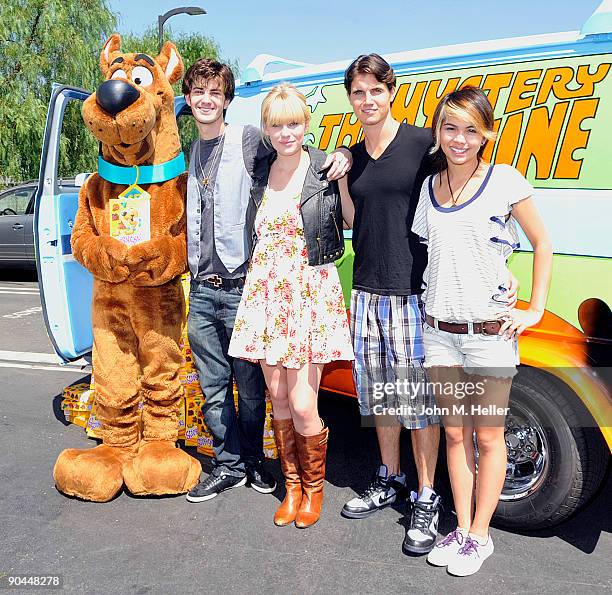 Cartoon character Scooby-Doo, actors Nick Palatas, Kate Melton, Robbie Amell and Hayley Kiyoke attend the 40th birthday celebration of Cesar Millan...