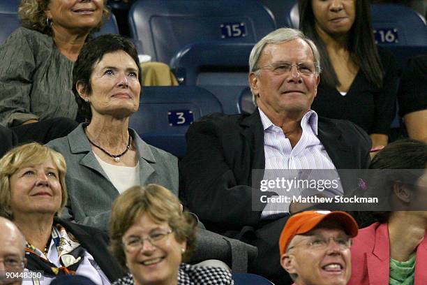 Tom Brokaw and his wife Meredith Lynn Auld watch Serena Williams in her match against Flavia Pennetta of Italy during day nine of the 2009 U.S. Open...