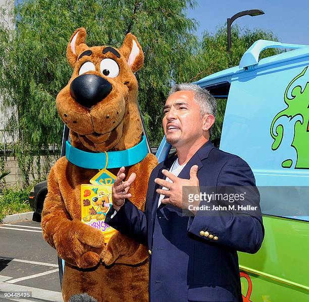 Cartoon character Scooby-Doo and host of the "Dog Whisperer" Cesar Millan attend their 40th birthday celebration at the East Valley Animal Shelter on...