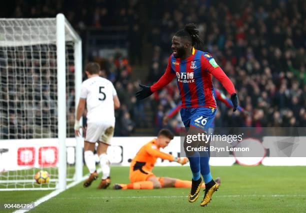 Bakary Sako of Crystal Palace celebrates after scoring his sides first goal during the Premier League match between Crystal Palace and Burnley at...