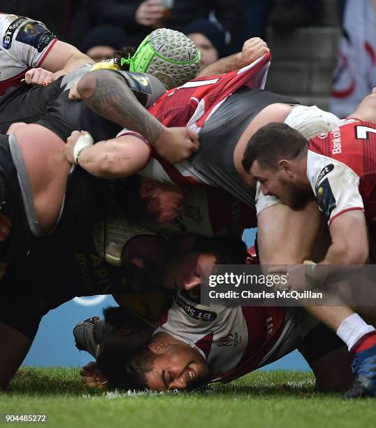 Charles Piutau of Ulster is caught at the bottom of a scrum during the European Rugby Champions Cup match between Ulster Rugby and La Rochelle at...