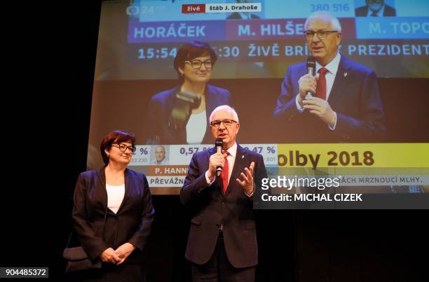 Former head of the Czech Academy of Sciences and candidate for the presidential election Jiri Drahos delivers a speech next to his wife Eva at his...