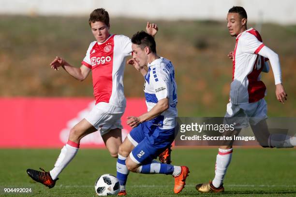 Carel Eiting of Ajax, Fabian Schnellhardt of MSV Duisburg, Noussair Mazraoui of Ajax during the match between Ajax v MSV Duisburg at the Estadio...