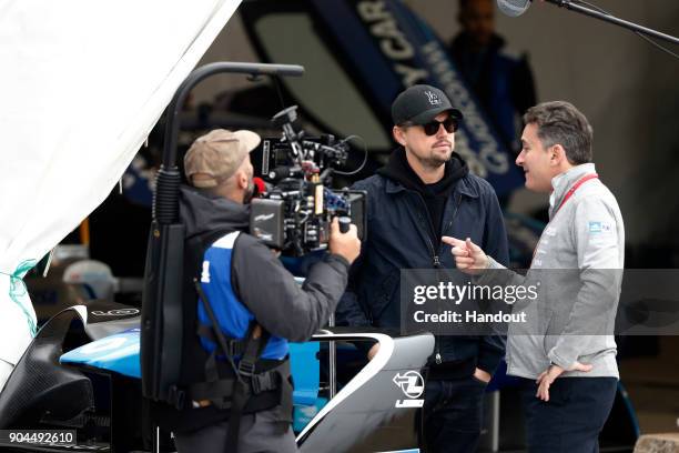 In this handout provided by FIA Formula E - Actor Leonardo di Caprio talks with Alejandro Agag, CEO, Formula E prior to the Marrakech ePrix, Round 3...