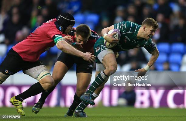 Theo Brophy Clews of London Irish makes a break during the European Rugby Challenge Cup between London Irish and Krasny Yar on January 13, 2018 in...