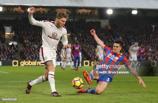 Martin Kelly of Crystal Palace tackles Jeff Hendrick of Burnley during the Premier League match between Crystal Palace and Burnley at Selhurst Park...