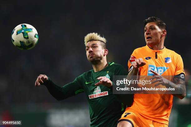 Jerome Gondorf of Werder Bremen battles for the ball with Steven Zuber of TSG 1899 Hoffenheim during the Bundesliga match between SV Werder Bremen...