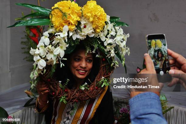 Visitors visit during the flower exhibition at Raymond ground, Vartak Nager, on January 12, 2018 in Mumbai, India.