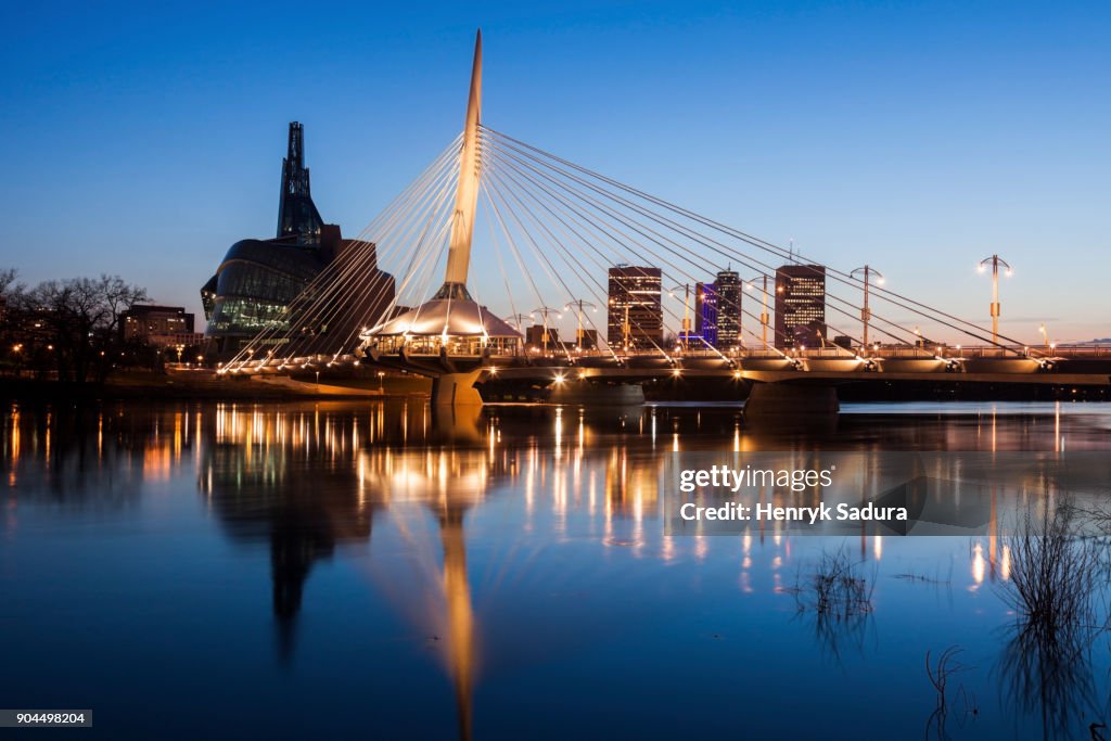 Canada, Manitoba, Winnipeg, Red river reflecting Esplanade Riel Bridge