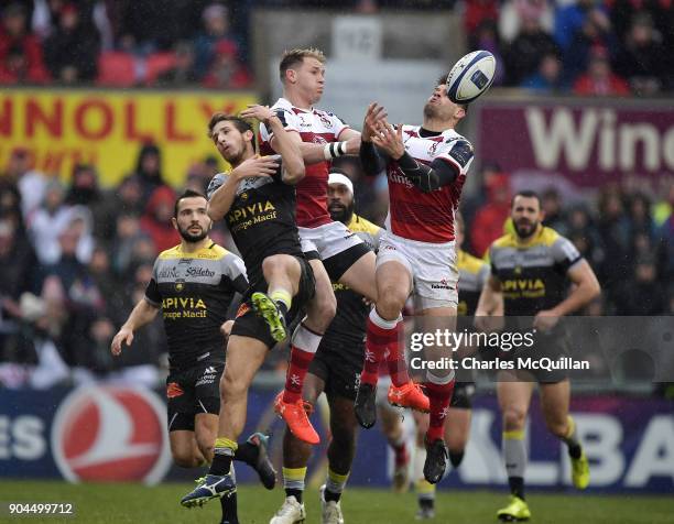 Louis Ludik and Craig Gilroy of Ulster and Vincent Rattez of La Rochelle during the European Rugby Champions Cup match between Ulster Rugby and La...