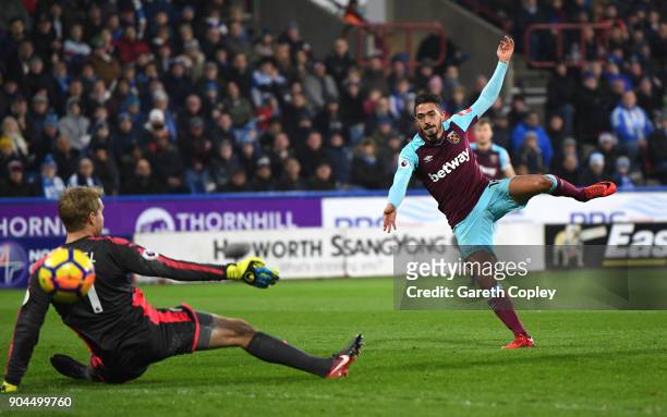 Manuel Lanzini of West Ham United scores his sides third goal during the Premier League match between Huddersfield Town and West Ham United at John...