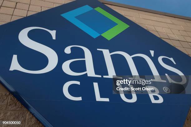 Sign hangs outside a Sam's Club store on January 12, 2018 in Streamwood, Illinois. The store is one of more 60 sheduled to close nationwide by the...