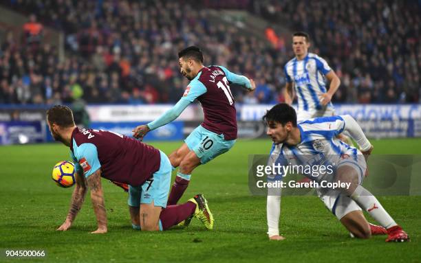 Manuel Lanzini of West Ham United scores his sides fourth goal during the Premier League match between Huddersfield Town and West Ham United at John...