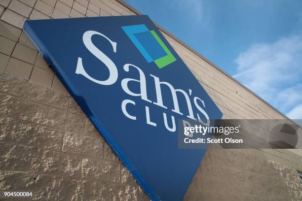 Sign hangs outside a Sam's Club store on January 12, 2018 in Streamwood, Illinois. The store is one of more 60 sheduled to close nationwide by the...
