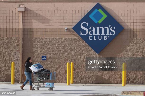 Shopper stocks up on merchandise at a Sam's Club store on January 12, 2018 in Streamwood, Illinois. The store is one of more 60 sheduled to close...