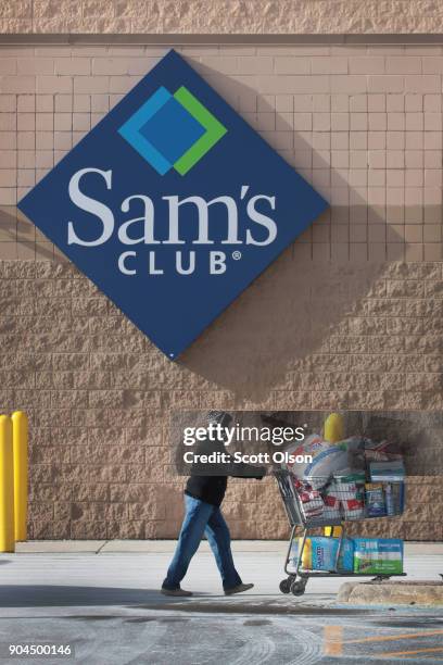 Shopper stocks up on merchandise at a Sam's Club store on January 12, 2018 in Streamwood, Illinois. The store is one of more 60 sheduled to close...