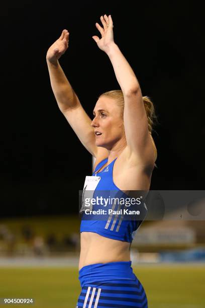 Sally Pearson acknowledges the spectators after winning the women's 100 metre hurdles during the Jandakot Airport Perth Track Classic at WA Athletics...