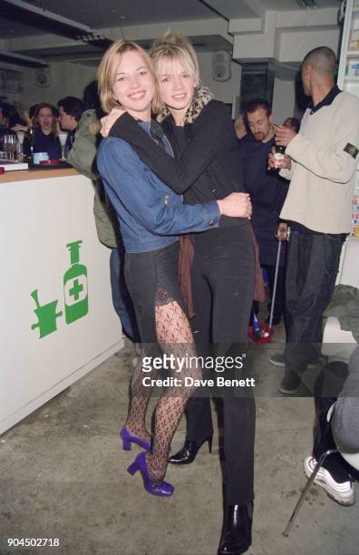 British presenter Zoe Ball with British broadcaster Sara Cox at the Pharmacy Club in Notting Hill, London, UK, 4th February 1998.