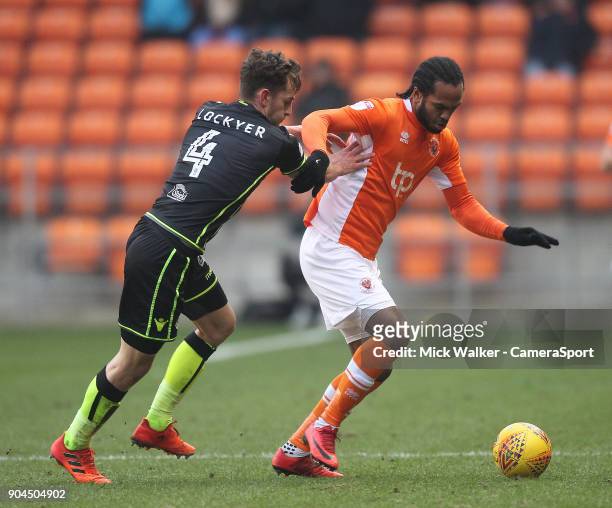 Blackpool's Nathan Delfouneso in action with Bristol Rovers' Tom Lockyer during the Sky Bet League One match between Blackpool and Bristol Rovers at...
