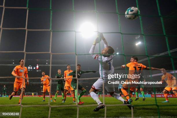 Theodor Gebre Selassie of Werder Bremen shoots and scores his teams first goal of the game past Goalkeeper, Oliver Baumann of TSG 1899 Hoffenheim...