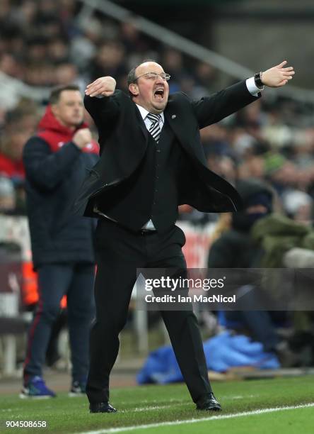 Rafael Benitez, Manager of Newcastle United gives his team instructions during the Premier League match between Newcastle United and Swansea City at...