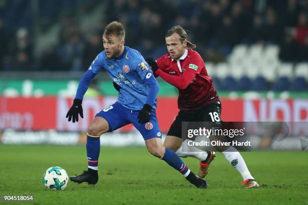 Iver Fossum of Hannover and Alexandru Maxim of Mainz compete for the ball during the Bundesliga match between Hannover 96 and 1. FSV Mainz 05 at...