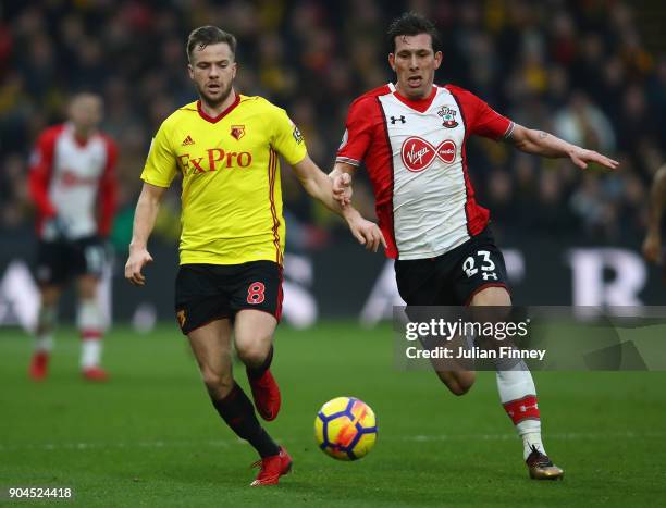Tom Cleverley of Watford and Pierre-Emile Hojbjerg of Southampton during the Premier League match between Watford and Southampton at Vicarage Road on...