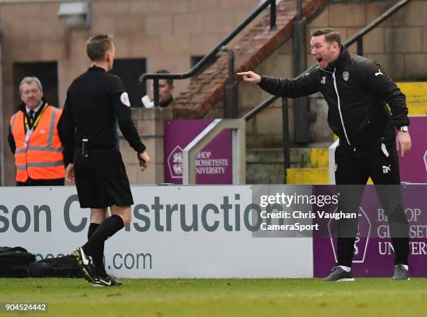 Notts County manager Kevin Nolan argues with Referee Ross Joyce during the Sky Bet League Two match between Lincoln City and Notts County at Sincil...