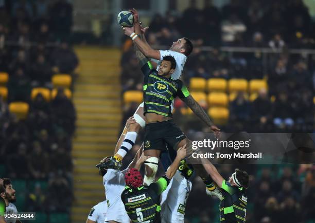 Courtney Lawes of Northampton Saints intercepts a line out ball from Alexandre Lapandry of ASM Clermont Auvergne during the European Rugby Champions...