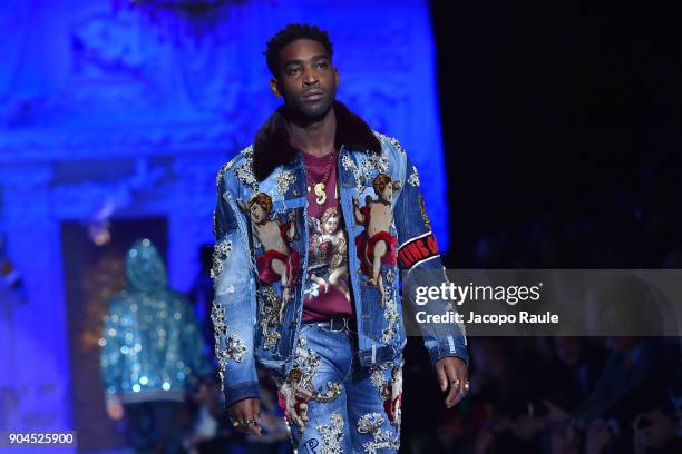 Tinie Tempah walks the runway at the Dolce & Gabbana show during Milan Men's Fashion Week Fall/Winter 2018/19 on January 13, 2018 in Milan, Italy.