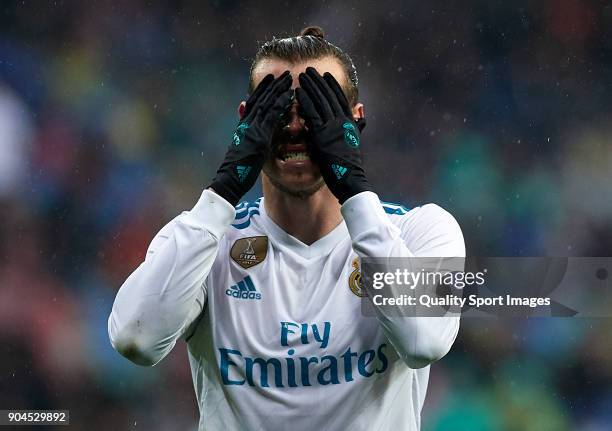 Gareth Bale of Real Madrid reacts during the La Liga match between Real Madrid and Villarreal at Estadio Santiago Bernabeu on January 13, 2018 in...
