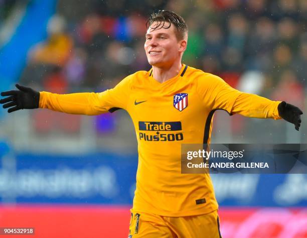 Atletico Madrid's French forward Kevin Gameiro celebrates after scoring his team's first goal during the Spanish league football match between SD...