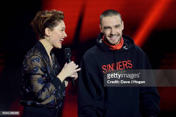 Images from this event are only to be used in relation to this event. Host Emma Willis and Liam Payne on stage at The BRIT Awards 2018 nominations...