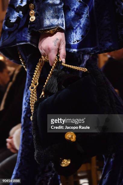 Model, bag details, walks the runway at the Versace show during Milan Men's Fashion Week Fall/Winter 2018/19 on January 13, 2018 in Milan, Italy.