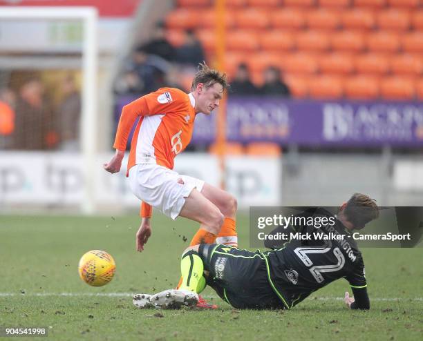 Blackpool's Sean Longstaff battles with Bristol Rovers' Joe Partington during the Sky Bet League One match between Blackpool and Bristol Rovers at...