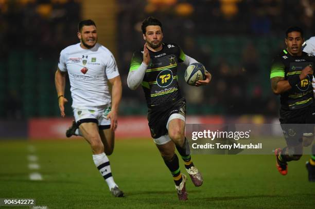 Ben Foden of Northampton Saints runs in to score a try during the European Rugby Champions Cup match between Northampton Saints and ASM Clermont...