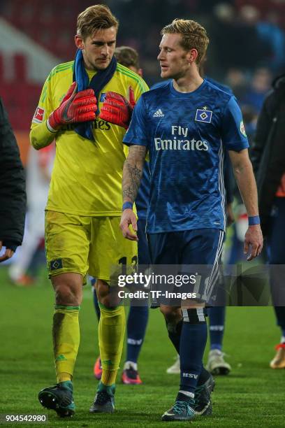 Goalkeeper Julian Pollersbeck of Hamburg and Andre Hahn of Hamburg look dejected after the Bundesliga match between FC Augsburg and Hamburger SV at...