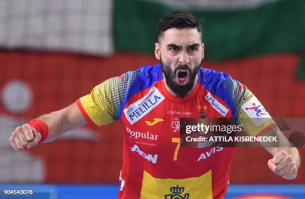 Spain's Valero Rivera Folch celebrates his score against Czech Republic during their match in the 13th edition of the EHF European Men's Handball...