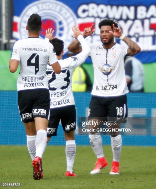 Kazim of Brazilian club Corinthians celebrates with teammates after scoring a first half goal against Scottish club Rangers FC during their Florida...