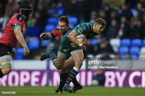 Theo Brophy Clews of London Irish makes a break during the European Rugby Challenge Cup between London Irish and Krasny Yar on January 13, 2018 in...