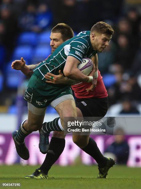 Theo Brophy Clews of London Irish makes a break during the European Rugby Challenge Cup between London Irish and Krasny Yar on January 13, 2018 in...