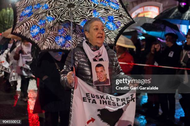 Some relatives of Basque prisoners carry banners reading 'Bring home Basque prisoners and fugitives' as they take part in a demonstration called by...