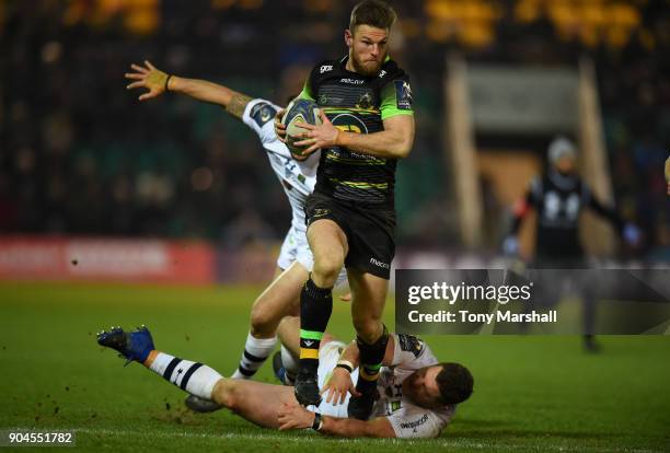 Rob Horne of Northampton Saints charges through the ASM Clermont Auvergne defence during the European Rugby Champions Cup match between Northampton...