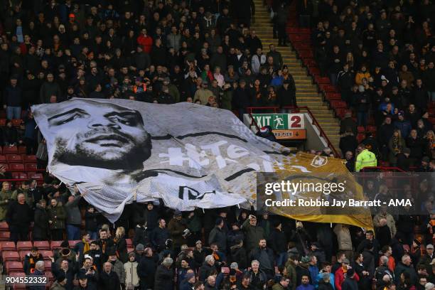 Fans of Wolverhampton Wanderers hold up a banner for Carl Ikeme of Wolverhampton Wanderers during the Sky Bet Championship match between Barnsley and...