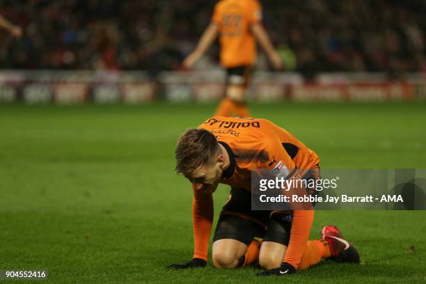 Barry Douglas of Wolverhampton Wanderers reacts during the Sky Bet Championship match between Barnsley and Wolverhampton at Oakwell Stadium on...