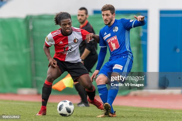 Tyrell Malacia of Feyenoord, Simon Grether of FC Luzern during the friendly match between Feyenoord Rotterdam and FC Luzern at the Estadio Municipal...