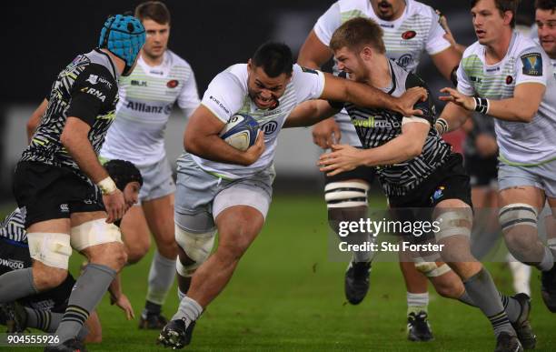 Saracens player Billy Vunipola on the charge during the European Rugby Champions Cup match between Ospreys and Saracens at Liberty Stadium on January...