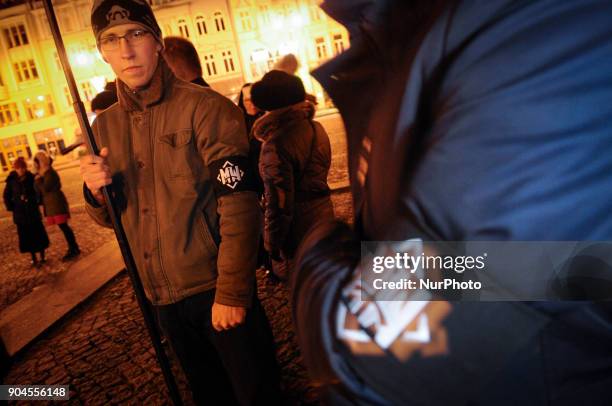 Young men are seen wearing armbands of the All-Polish Youth or Mlodziez Wszechpolska in Bydgoszcz, Poland on January 13, 2018. The nationalist group...