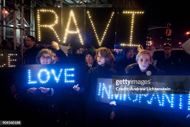 Supporters of the New Sanctuary Movement rally outside a Homeland Security detention center to protest the arrest and probable deportation of...